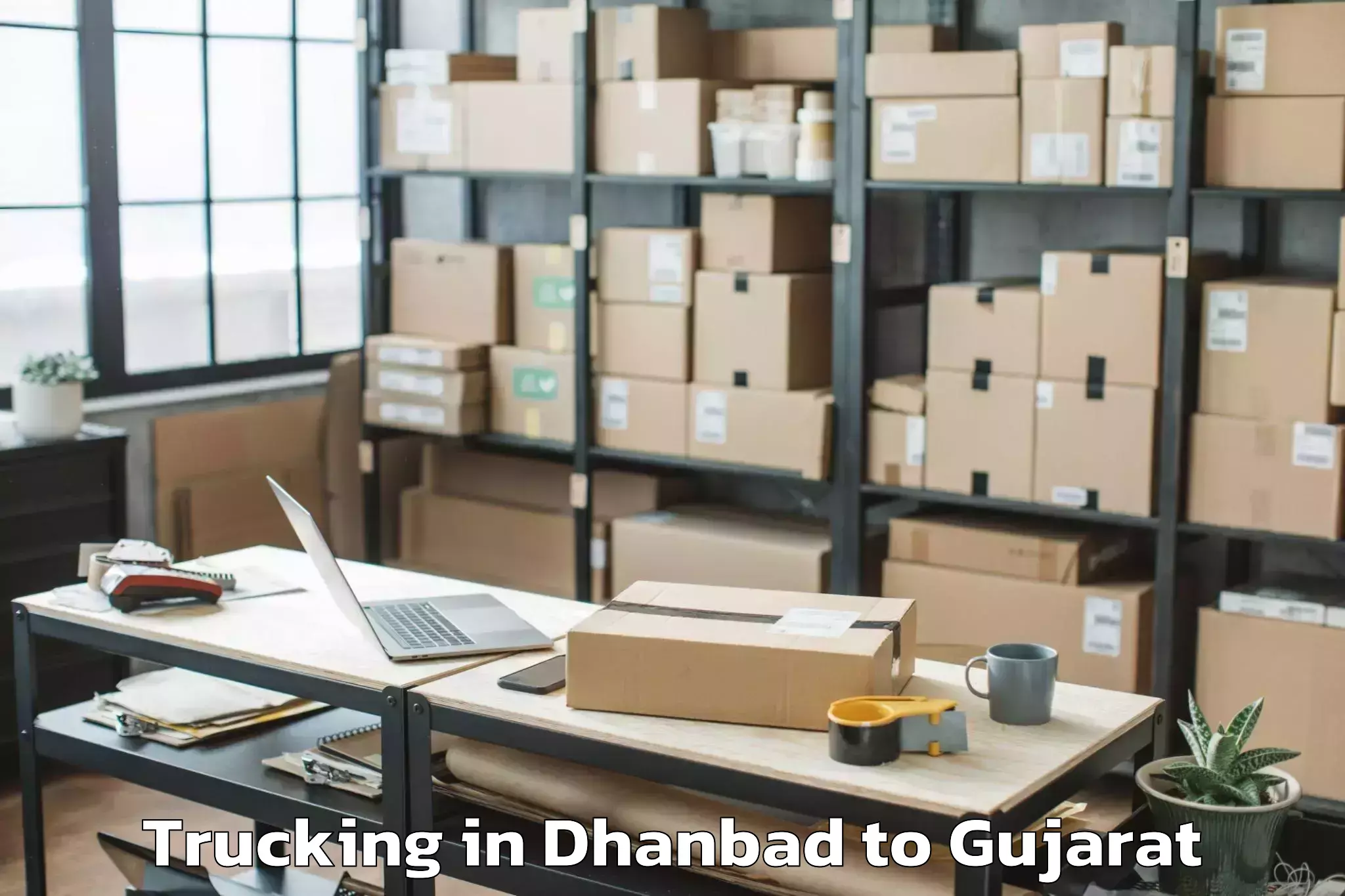 Expert Dhanbad to Vapi Trucking